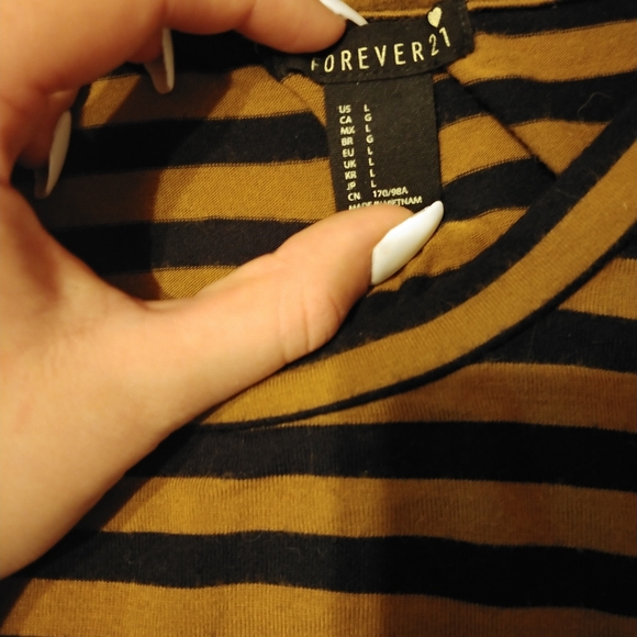 Long sleeved stripped shirt. - Picture 2 of 2